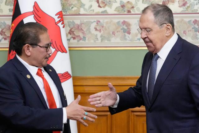 Russia's Foreign Minister Sergey Lavrov (R) and Brunei's Second Minister of Foreign Affairs Erywan Yusof shake hands after their talks at Zinaida Morozova's Mansion in Moscow on March 3, 2026. (Photo by Pavel Bednyakov / POOL / AFP)