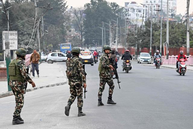 Army personnel patrol a street ahead of Nepal's general election in Kathmandu on March 3, 2026.  (Photo by Tauseef MUSTAFA / AFP)