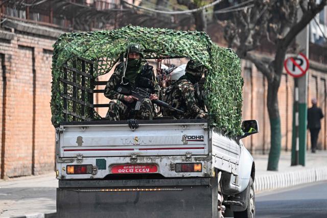 Army personnel patrol a street ahead of Nepal's general election in Kathmandu on March 3, 2026.  (Photo by Tauseef MUSTAFA / AFP)