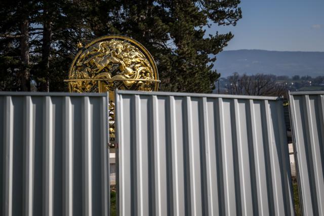 This photograph shows protections around the Celestial Sphere, known also as the Woodrow Wilson Memorial Sphere, as it is undergoing renovation at the "Palais des Nations" building which houses the United Nations Offices in Geneva on March 3, 2026. The United Nations Office at Geneva has embarked on a full renovation of its historic headquarters combined with the construction of new buildings. (Photo by Fabrice COFFRINI / AFP)