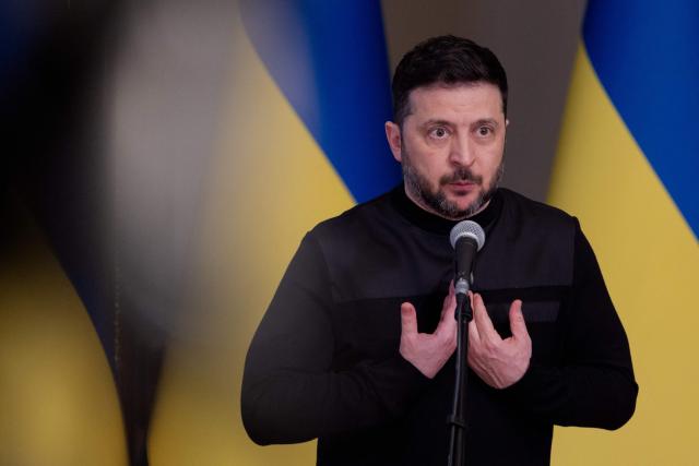Ukraine's President Volodymyr Zelensky gestures as he speaks during a press conference in Kyiv on March 3, 2026, amid the Russian invasion of Ukraine. (Photo by Tetiana DZHAFAROVA / AFP)