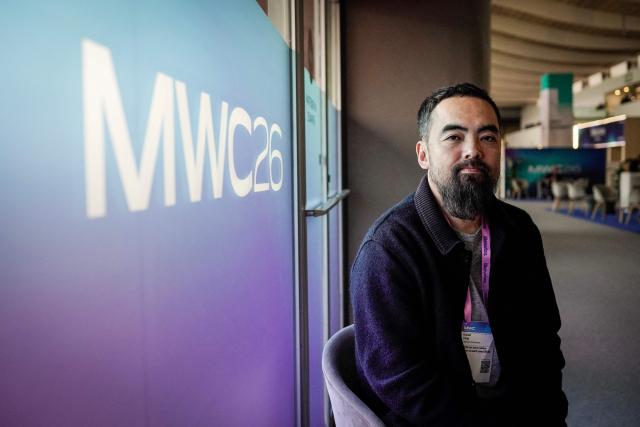 Kaiwei Tang, CEO and Co-founder of Light, poses for a photograph during an AFP interview at the Mobile World Congress (MWC), the world's biggest mobile technology showcase and fair in Barcelona on March 3, 2026. The Mobile World Congress (MWC), the major annual telecommunications event, opened in Barcelona for an edition where Artificial Intelligence in telecommunications will take center stage in the debates. The event, which marks its twentieth anniversary, will host the world's leading telecommunications operators and numerous manufacturers. 109,000 industry professionals and visitors are expected. (Photo by Manaure Quintero / AFP)