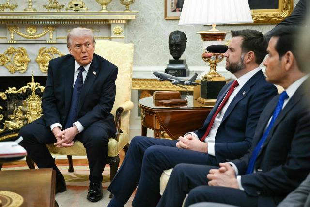 US Secretary of State Marco Rubio (R) and Vice President JD Vance (C) look on as US President Donald Trump speaks during a meeting with German Chancellor Friedrich Merz (out of frame) in the Oval Office of the White House in Washington, DC on March 3, 2026. Chancellor Merz is the first European leader to visit President Trump since the United States and Israel launched their war against Iran. (Photo by ANDREW CABALLERO-REYNOLDS / AFP)