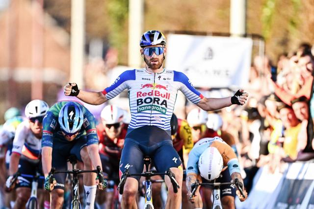 Red Bull-BORA-hansgrohe's Belgian Jordi Meeus celebrates after he crosses the finish line to win the 'Ename Samyn Classic' one day cycling race, 203,8km from Quaregnon to Dour on March 3, 2026. (Photo by JASPER JACOBS / Belga / AFP) / Belgium OUT