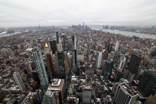 The lower Manhattan skyline is pictured from the top of the Empire State Building n New York on March 3, 2026. (Photo by CHARLY TRIBALLEAU / AFP)