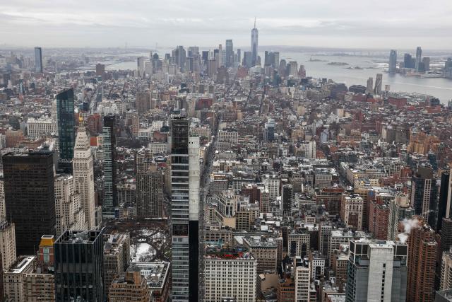 The lower Manhattan skyline is pictured from the top of the Empire State Building n New York on March 3, 2026. (Photo by CHARLY TRIBALLEAU / AFP)