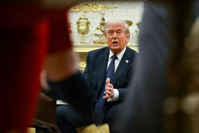 US President Donald Trump speaks during a meeting with German Chancellor Friedrich Merz in the Oval Office of the White House in Washington, DC on March 3, 2026. Chancellor Merz is the first European leader to visit President Trump since the United States and Israel launched their war against Iran. (Photo by ANDREW CABALLERO-REYNOLDS / AFP)