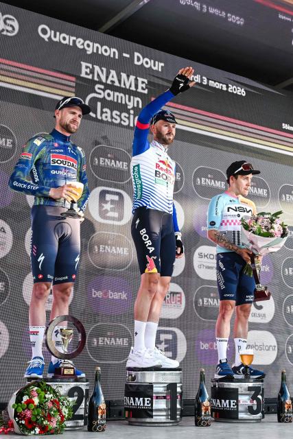 (From L) Second-placed Soudal Quick-Step's Belgian Laurenz Rex, winner Red Bull-BORA-hansgrohe's Belgian Jordi Meeus and NSN Cycling Team's French Hugo Hofstetter celebrate on the podium after the 'Ename Samyn Classic' one day cycling race, 203,8km from Quaregnon to Dour on March 3, 2026. (Photo by MAARTEN STRAETEMANS / Belga / AFP) / Belgium OUT