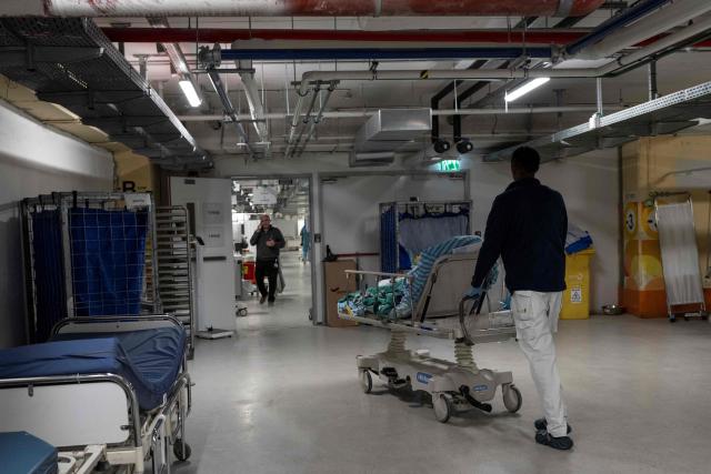 Hospital workers carry out their duties during the Purim holidays, at Schneider Children Medical Center which established a fortified underground hospital which includes approximately 200 inpatient beds located about 30 meters below ground level, in Petah Tikva, central Israel on March 3, 2026. The United States and Israel launched strikes against Iran on February 28, with the killing of Iran's supreme leader and the Islamic republic retaliated with barrages of missiles at Gulf states and Israel. (Photo by Maya Levin / AFP)