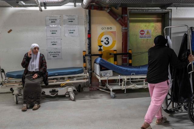 Hospital workers carry out their duties during the Purim holidays, at Schneider Children Medical Center which established a fortified underground hospital which includes approximately 200 inpatient beds located about 30 meters below ground level, in Petah Tikva, central Israel on March 3, 2026. The United States and Israel launched strikes against Iran on February 28, with the killing of Iran's supreme leader and the Islamic republic retaliated with barrages of missiles at Gulf states and Israel. (Photo by Maya Levin / AFP)