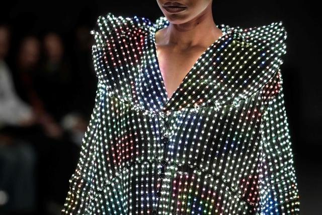 A model presents a creation for Anrealage for the Women's Ready to Wear Fall/Winter 2026-2027 collection fashion show as part of the Paris Women Fashion Week, in Paris, on March 3, 2026. (Photo by STEPHANE DE SAKUTIN / AFP)