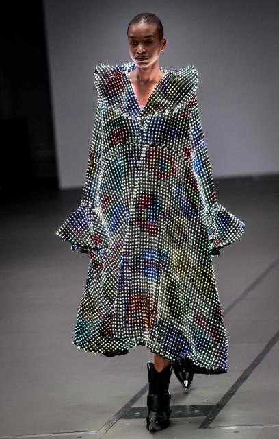 A model presents a creation for Anrealage for the Women's Ready to Wear Fall/Winter 2026-2027 collection fashion show as part of the Paris Women Fashion Week, in Paris, on March 3, 2026. (Photo by STEPHANE DE SAKUTIN / AFP)