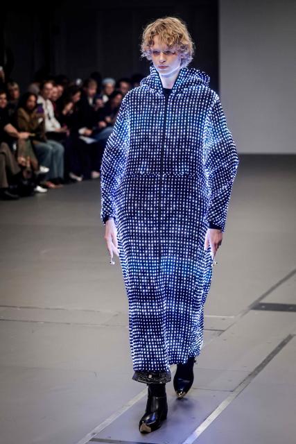 A model presents a creation for Anrealage for the Women's Ready to Wear Fall/Winter 2026-2027 collection fashion show as part of the Paris Women Fashion Week, in Paris, on March 3, 2026. (Photo by STEPHANE DE SAKUTIN / AFP)