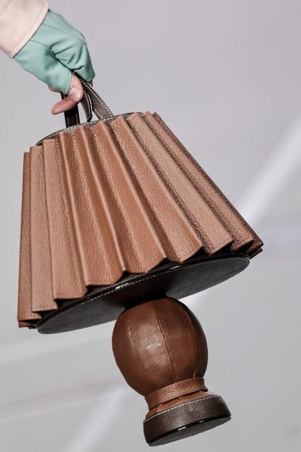 A model presents a handbag for Anrealage for the Women's Ready to Wear Fall/Winter 2026-2027 collection fashion show as part of the Paris Women Fashion Week, in Paris, on March 3, 2026. (Photo by STEPHANE DE SAKUTIN / AFP)