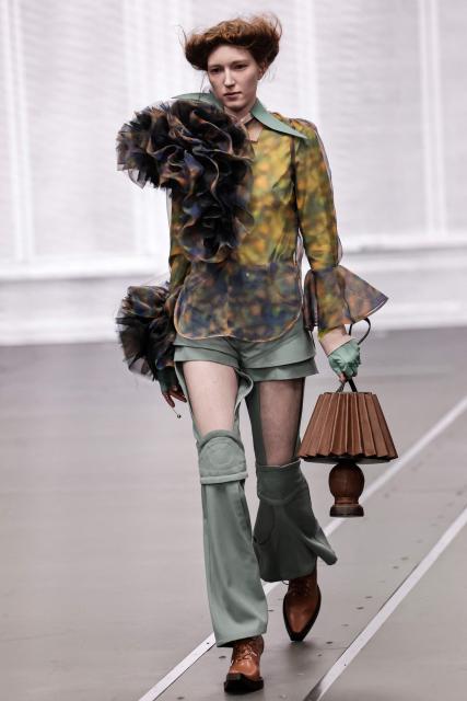 A model presents a creation for Anrealage for the Women's Ready to Wear Fall/Winter 2026-2027 collection fashion show as part of the Paris Women Fashion Week, in Paris, on March 3, 2026. (Photo by STEPHANE DE SAKUTIN / AFP)