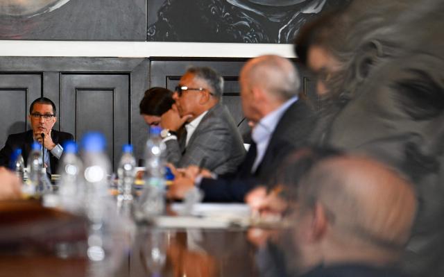 The President of the Parliamentary Amnesty Commission Jorge Arreaza (L) speaks during a meeting of the Amnesty Commission with members of the justice system at the National Assembly headquarters in Caracas on March 3, 2026. (Photo by Juan BARRETO / AFP)