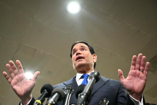 US Secretary of State Marco Rubio speaks to reporters as he arrives to brief Senators on US military action in Iran, at the US Capitol in Washington, DC on March 3, 2026. The United States hit hundreds of targets across Iran, and Israel expanded its bombing to Lebanon on Monday as President Donald Trump vowed to avenge the first US deaths in the war he launched to topple Tehran's ruling clerics. Iranian forces fired missiles and drones across the Middle East, killing people in Israel and the United Arab Emirates, in retaliation for the conflict that began February 28 with the death of Iran's supreme leader, Ayatollah Ali Khamenei. (Photo by Jim WATSON / AFP)