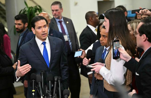 US Secretary of State Marco Rubio speaks to journalists as he arrives to brief Senators on US military action in Iran, at the US Capitol in Washington, DC on March 3, 2026. The United States hit hundreds of targets across Iran, and Israel expanded its bombing to Lebanon on Monday as President Donald Trump vowed to avenge the first US deaths in the war he launched to topple Tehran's ruling clerics. Iranian forces fired missiles and drones across the Middle East, killing people in Israel and the United Arab Emirates, in retaliation for the conflict that began February 28 with the death of Iran's supreme leader, Ayatollah Ali Khamenei. (Photo by Mandel NGAN / AFP)