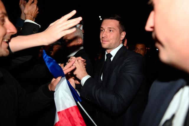 President of French far-right party Rassemblement National (RN) Jordan Bardella arrives at a campaign meeting to support National Rally (RN)'s Nimes mayoral candidate Julien Sanchez, ahead of France's upcoming municipal elections in Nimes, southern France on March 3, 2026. French voters head to the polls for municipal elections on March 15 and 22, 2026. (Photo by Sylvain THOMAS / AFP)