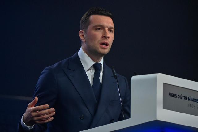 President of French far-right party Rassemblement National (RN) Jordan Bardella addresses the audience at a campaign meeting to support National Rally (RN)'s Nimes mayoral candidate Julien Sanchez, ahead of France's upcoming municipal elections in Nimes, southern France on March 3, 2026. French voters head to the polls for municipal elections on March 15 and 22, 2026. (Photo by Sylvain THOMAS / AFP)
