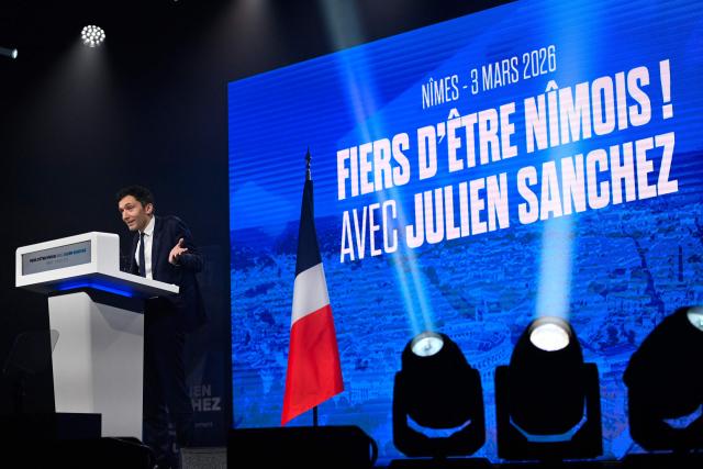 National Rally (RN)'s Nimes mayoral candidate Julien Sanchez addresses the audience during a campaign meeting, ahead of France's upcoming municipal elections in Nimes, southern France on March 3, 2026. French voters head to the polls for municipal elections on March 15 and 22, 2026. (Photo by Sylvain THOMAS / AFP)