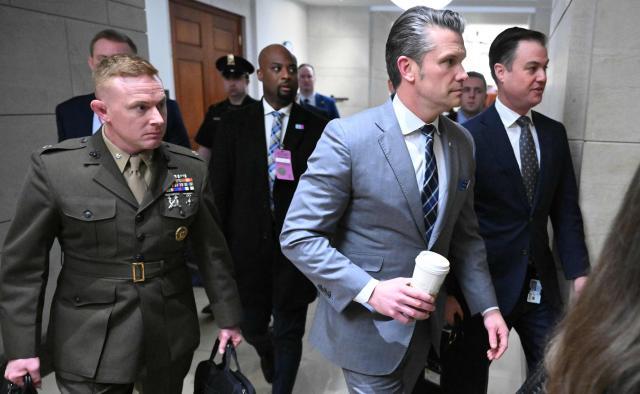 US Secretary of Defense Pete Hegseth leaves after briefing Senators on US military action in Iran, at the US Capitol in Washington, DC, on March 3, 2026. The United States hit hundreds of targets across Iran, and Israel expanded its bombing to Lebanon on Monday as President Donald Trump vowed to avenge the first US deaths in the war he launched to topple Tehran's ruling clerics. Iranian forces fired missiles and drones across the Middle East, killing people in Israel and the United Arab Emirates, in retaliation for the conflict that began February 28 with the death of Iran's supreme leader, Ayatollah Ali Khamenei. (Photo by Mandel NGAN / AFP)