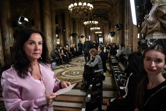 Guests arrive for a Women's Ready to Wear Fall/Winter 2026-2027 collection fashion show as part of the Paris Women Fashion Week, at the Palais Garnier, in Paris, on March 3, 2026. (Photo by Blanca CRUZ / AFP)