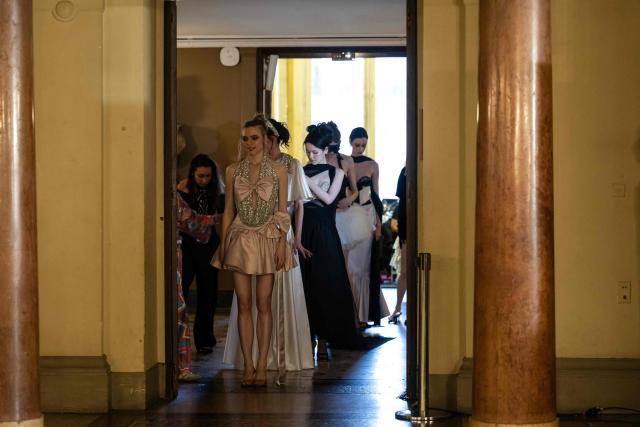 Models wait to go out on the catwalk during the Brooke Berry for the Women's Ready to Wear Fall/Winter 2026-2027 collection fashion show as part of the Paris Women Fashion Week, at the Palais Garnier, in Paris, on March 3, 2026. (Photo by Blanca CRUZ / AFP)