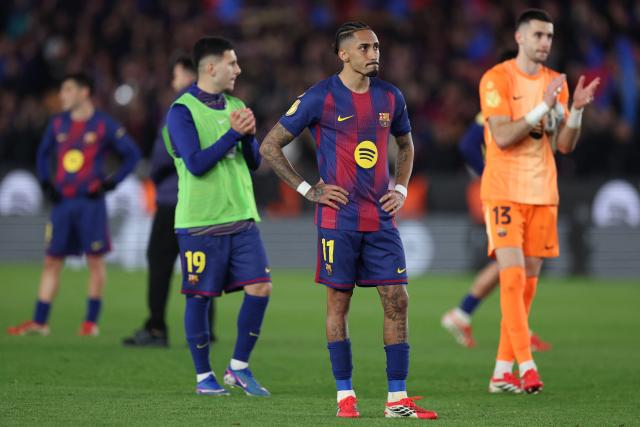 Barcelona's Brazilian forward #11 Raphinha reacts at the end of the Copa del Rey (King's Cup) semi final second leg football match between FC Barcelona and Club Atletico de Madrid at Camp Nou Stadium in Barcelona on March 3, 2026. (Photo by Josep LAGO / AFP)