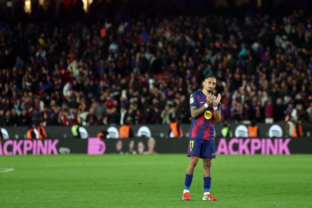 Barcelona's Brazilian forward #11 Raphinha claps at the end of the Copa del Rey (King's Cup) semi final second leg football match between FC Barcelona and Club Atletico de Madrid at Camp Nou Stadium in Barcelona on March 3, 2026. (Photo by Josep LAGO / AFP)