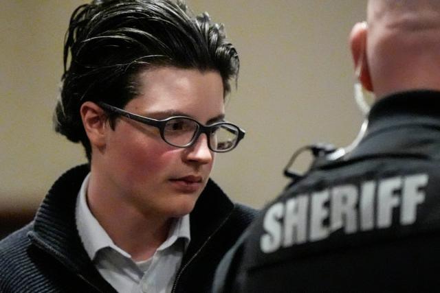 (FILES) Colt Gray, the teenager accused of the fatal mass shooting at Georgia's Apalachee High School, attends a hearing at the Barrow County Courthouse in Winder, Georgia, on December 9, 2025. Colt Gray's father Colin Gray was found guilty of murder and manslaughter on March 3, 2026 in a rare case of a parent charged over a shooting carried out by their child. Colin Gray, 55, was convicted by a jury in Georgia of second-degree murder, involuntary manslaughter and other offenses in connection with the September 2024 shooting at Apalachee High School by his troubled son Colt which left four dead. (Photo by Mike Stewart / POOL / AFP) / POOL PHOTO