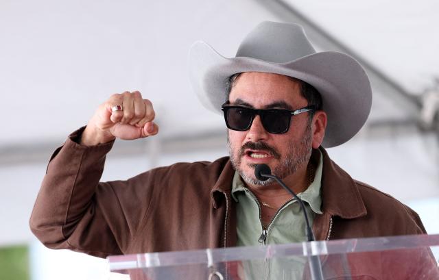 Comedian Alfred Robles speaks during US comedian and actor Gabriel "Fluffy" Iglesias' Walk of Fame Star ceremony in the Hollywood neighborhood of Los Angeles, California on March 3, 2026. (Photo by VALERIE MACON / AFP)