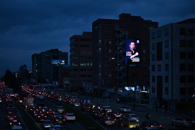 An electronic billboard displays an electoral campaign advertisement for Colombian deputy candidate Josias Fiesco of the Centro Democratico party in Bogota on March 3, 2026. Colombia will hold legislative elections on March 8 and presidential elections on May 31. (Photo by Pablo VERA / AFP)