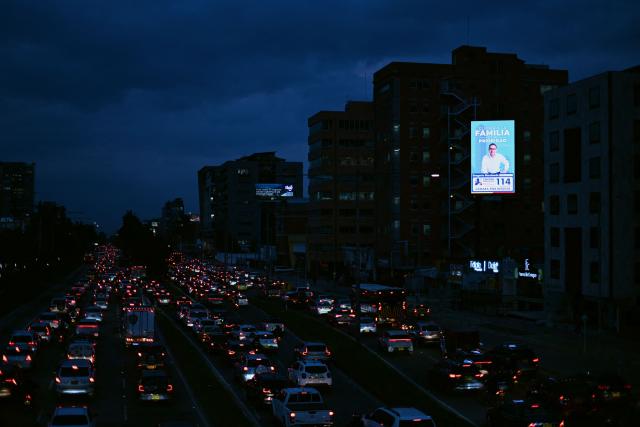 TOPSHOT - An electronic billboard displays an electoral campaign advertisement for Colombian deputy candidate Gregorio Marulanda of the Centro Democratico party in Bogota on March 3, 2026. Colombia will hold legislative elections on March 8 and presidential elections on May 31. (Photo by Pablo VERA / AFP)