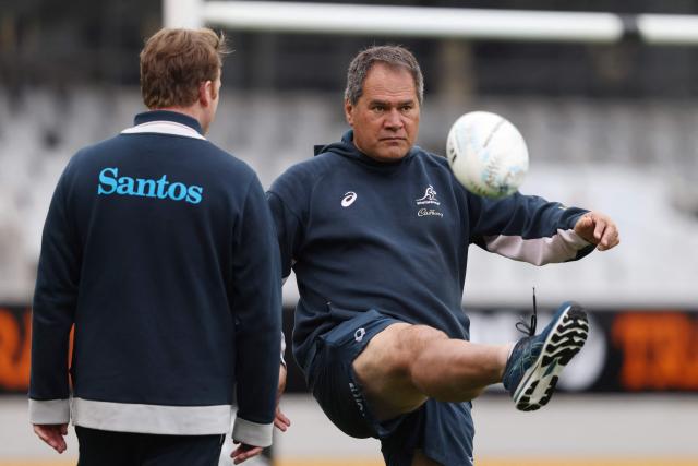 (FILES) Australia's head coach Dave Rennie kicks a ball during the team's captain's run at Eden Park in Auckland on September 23, 2022, ahead of their rugby Test match against New Zealand on September 24. New Zealand's All Blacks named Dave Rennie on March 4, 2026 as head coach, replacing Scott Robertson who was sacked midway through a four-year contract. (Photo by MICHAEL BRADLEY / AFP)