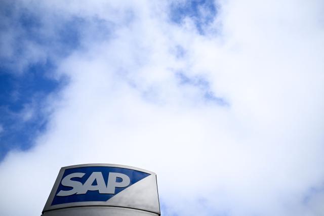 (FILES) The logo of German software giant SAP is pictured at the SAP headquarters in Walldorf, southwestern Germany, on February 25, 2026. Europe should focus on competing in industrial AI, a top executive at German software giant SAP said, as the continent plays catch-up in the race for the cutting-edge technology against the United States and China. (Photo by Kirill KUDRYAVTSEV / AFP)