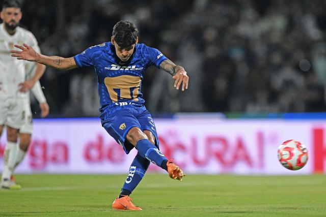 Pumas' Paraguayan forward #31 Robert Morales takes a penalty kick and scores his team's second goal during the Liga MX Clausura match between Pumas and Toluca at Olimpico Universitario Stadium in Mexico City on March 3, 2026. (Photo by Carl DE SOUZA / AFP)