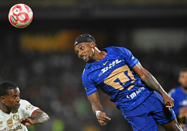 Pumas' Colombian defender #77 Alvaro Angulo heads the ball during the Liga MX Clausura match between Pumas and Toluca at Olimpico Universitario Stadium in Mexico City on March 3, 2026. (Photo by Carl DE SOUZA / AFP)