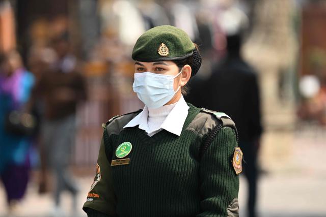 A police officer stands guard at Darbaar Square in Kathmandu on March 4, 2026, a day before the country’s parliamentary elections. Nepal set up polling centres on March 4 for one of its most hotly contested elections since the end of civil war in 2006, six months after deadly anti-corruption protests toppled the government. (Photo by TAUSEEF MUSTAFA / AFP)