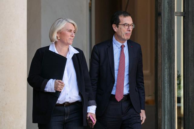 France's Health Minister Stephanie Rist (L) and France's Labour Minister Jean-Pierre Farandou leave after the weekly cabinet meeting at The Elysee Presidential Palace in Paris on March 4, 2026. (Photo by Thomas SAMSON / AFP)