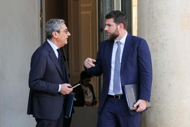 France's Trade Minister Serge Papin (L) and France's Housing Minister Vincent Jeanbrun discuss as they leave after the weekly cabinet meeting at The Elysee Presidential Palace in Paris on March 4, 2026. (Photo by Thomas SAMSON / AFP)