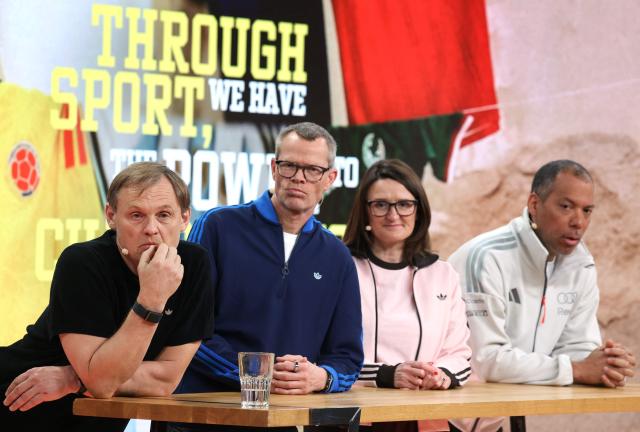 (L-R) Bjoern Gulden, Chief Executive Officer of German sportswear giant Adidas, Harm Ohlmeyer, Chief Financial Officer, Michelle Robertson, Global Human Resources, and Mathieu Sidokpohou, Sales Director, attend the company's annual press conference in Herzogenaurach, southern Germany, on March 4, 2026. Adidas shares slumped after the company gave a disappointing 2026 profit forecast and warned of a 400-million-euro ($465-million) hit from US tariffs and exchange rate effects. The maker of Gazelle and Samba trainers said it expects operating profit to rise to 2.3 billion euros for 2026, as it unveiled its annual results. The group's shares fell about eight percent on the Frankfurt Stock Exchange after the announcement, and were trading around 137 euros each. (Photo by Karl-Josef Hildenbrand / AFP)