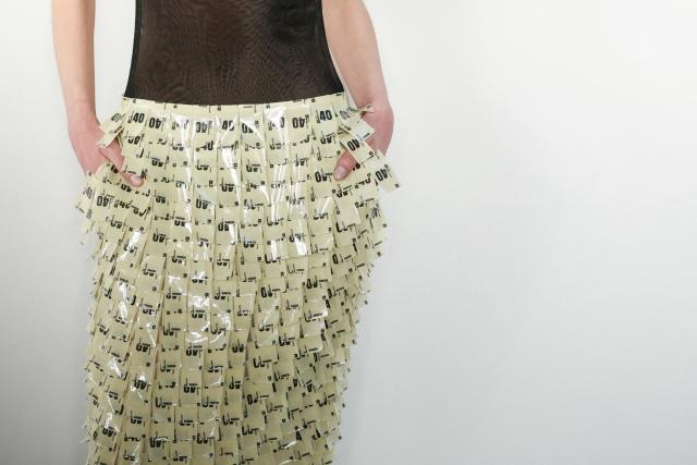 A model presents a creation for Courreges during the first look presentation for the Women's Ready to Wear Fall/Winter 2026-2027 collection fashion show as part of the Paris Women Fashion Week, in Paris, on March 4, 2026. (Photo by Alain JOCARD / AFP)