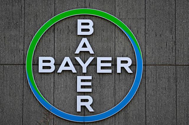 The company logo of German chemical giant Bayer is pictured at the company's site in Berlin on March 4, 2026. The company presented its annual report. (Photo by Tobias SCHWARZ / AFP)