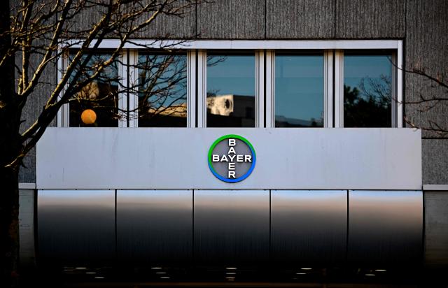 The company logo of German chemical giant Bayer is pictured at the company's site in Berlin on March 4, 2026. The company presented its annual report. (Photo by Tobias SCHWARZ / AFP)