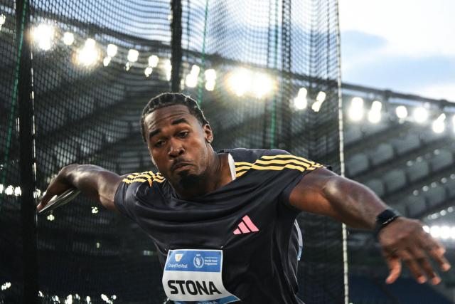 (FILES) Jamaica's Roje Stona competes in the men's discus throw event of the Diamond League athletics meeting at the Olympic stadium in Rome on August 30, 2024. Following its 64th place finish at the Paris 2024 Olympic Games with 101 athletes and no gold medals, the country's worst result at an Olympiad, Turkey has launched a vast recruitment campaign that has already seen eleven foreign athletes, including five Kenyan and Jamaican Olympic medalists, granted Turkish citizenship, ahead of the Los Angeles 2028 Olympics. (Photo by Tiziana FABI / AFP)