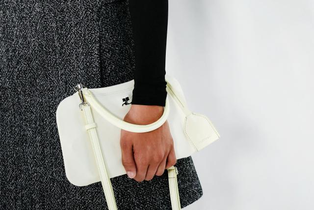 A model presents a creation for Courreges during the first look presentation for the Women's Ready to Wear Fall/Winter 2026-2027 collection fashion show as part of the Paris Women Fashion Week, in Paris, on March 4, 2026. (Photo by Alain JOCARD / AFP)