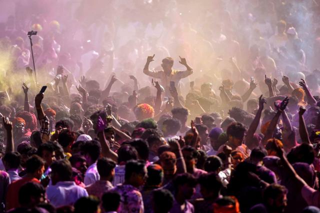 TOPSHOT - Revellers smeared with coloured powder celebrate on the occasion of the Hindu spring festival of Holi in Pushkar on March 4, 2026. (Photo by Himanshu SHARMA / AFP)