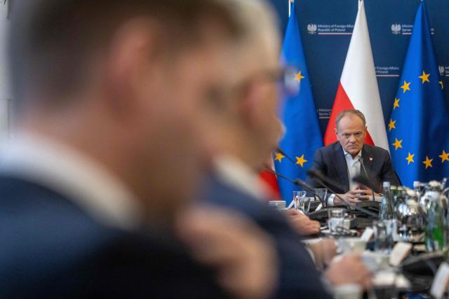 Poland's Prime Minister Donald Tusk takes part in a meeting of a Coordinating Committee on the Situation in the Middle East at Polish Foreign Afairs Ministry building in Warsaw on March 4, 2026. (Photo by Wojtek RADWANSKI / AFP)