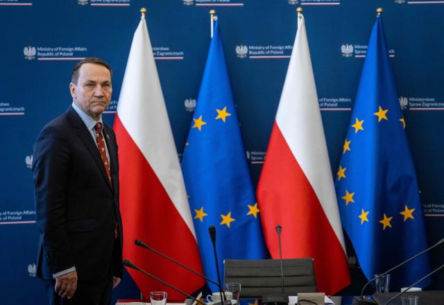 Poland's Deputy Prime Minister and Minister of Foreign Afairs Radoslaw Sikorski arrives at a meeting of a Coordinating Committee on the Situation in the Middle East at Polish Foreign Afairs Ministry building in Warsaw on March 4, 2026. (Photo by Wojtek RADWANSKI / AFP)